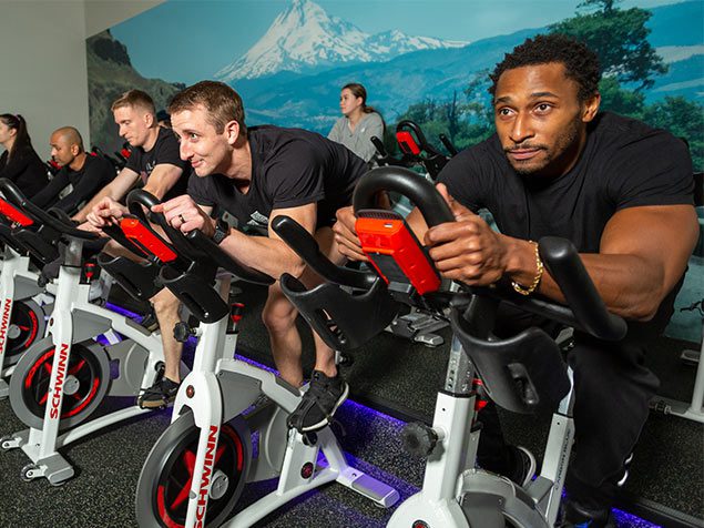 People Cycling on Machines in muv Fitness Center in gym near me