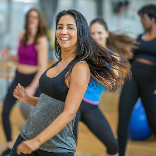 women dancing in zumba class in gym near me