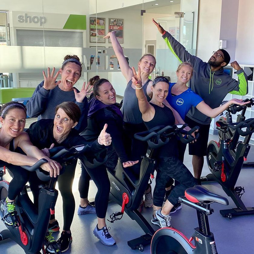 spin class posing for a picture in a studio near me chapin