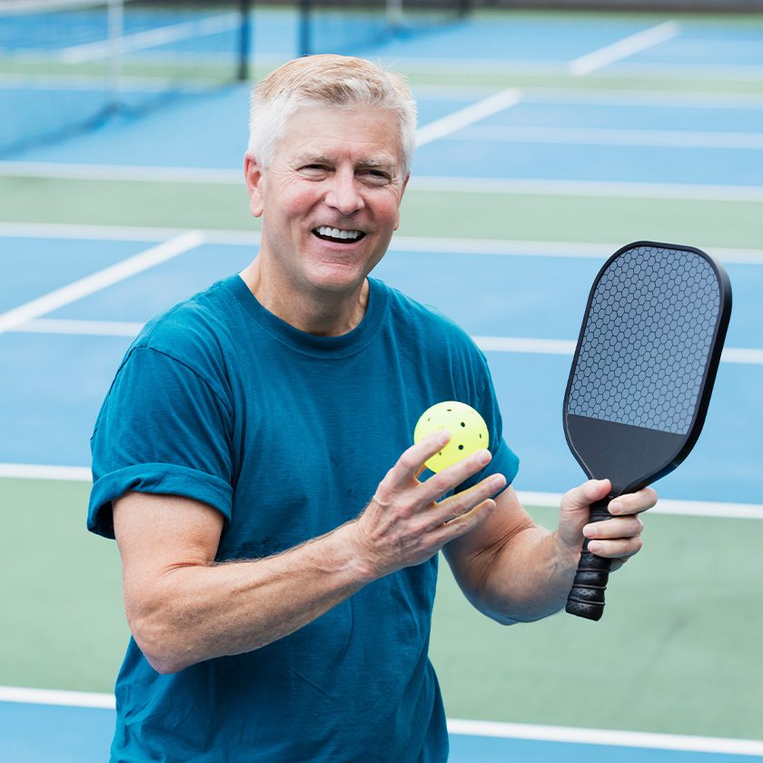 man getting ready for pickleball
