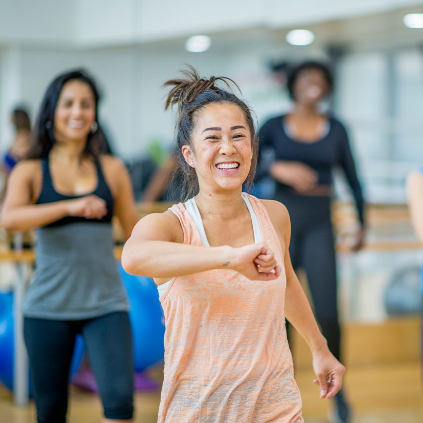 woman dancing in a fitness class