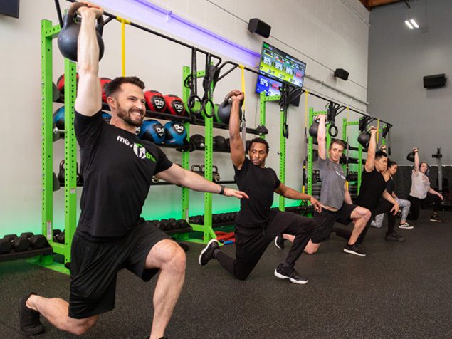 bootcamp class led by an onsite certified personal trainer using kettlebells at a gym near me in north spokane