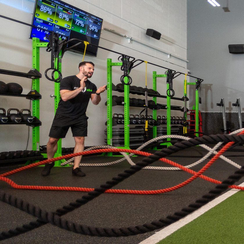 certified personal trainer leading a group at a gym in north spokane