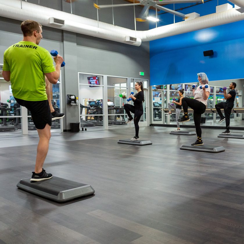 group fitness class using small free weights at a gym in north spokane