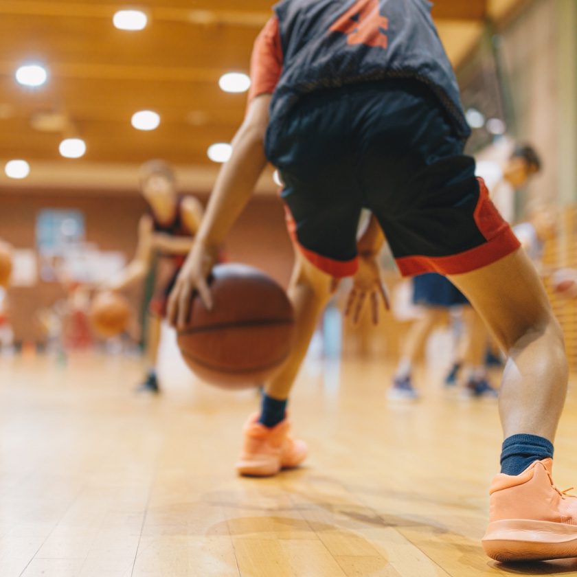 indoor basketball court with kids playing at a gym in north spokane