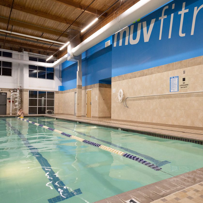 indoor pool with dividers in a fitness center in north spokane