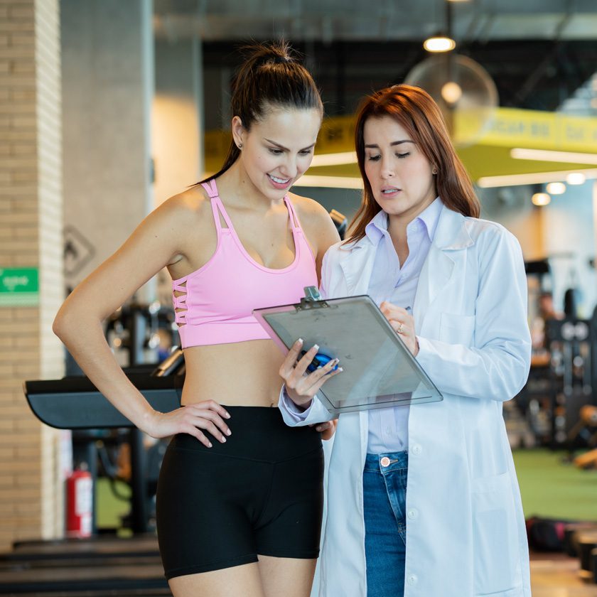 nutrition services consultation between advisor and athlete at a fitness center in north spokane