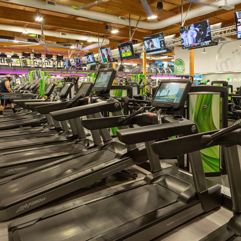 cardio equipment with strength training in front of it at a gym in north spokane