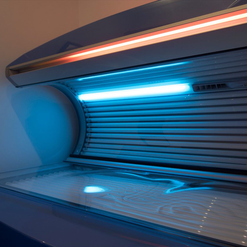 tanning bed in modern gym near me