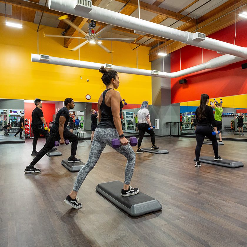 group working out in bootcamp in gym