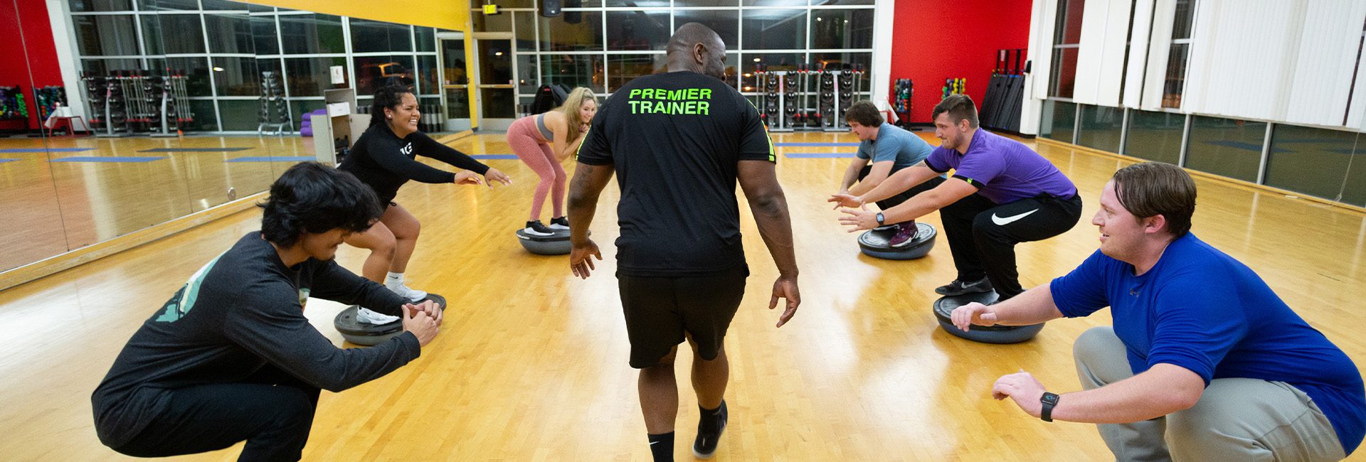 group working out with trainer in gym near me south spokane