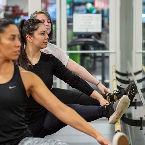 women in a barre class