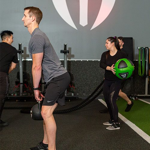 group of people working out togethr