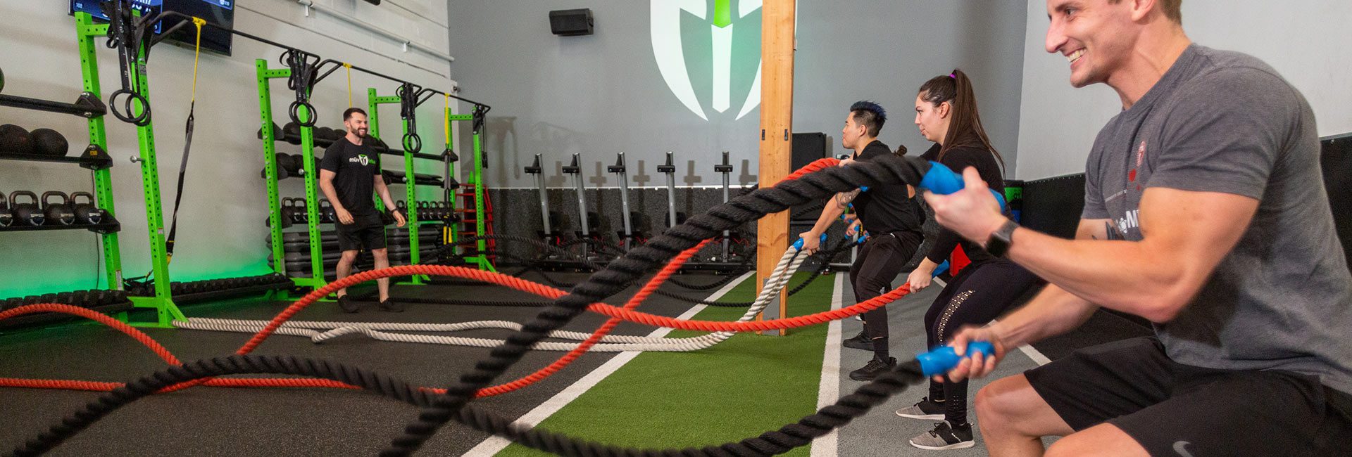 group of people working out with ropes In Gym Near Me East Spokane