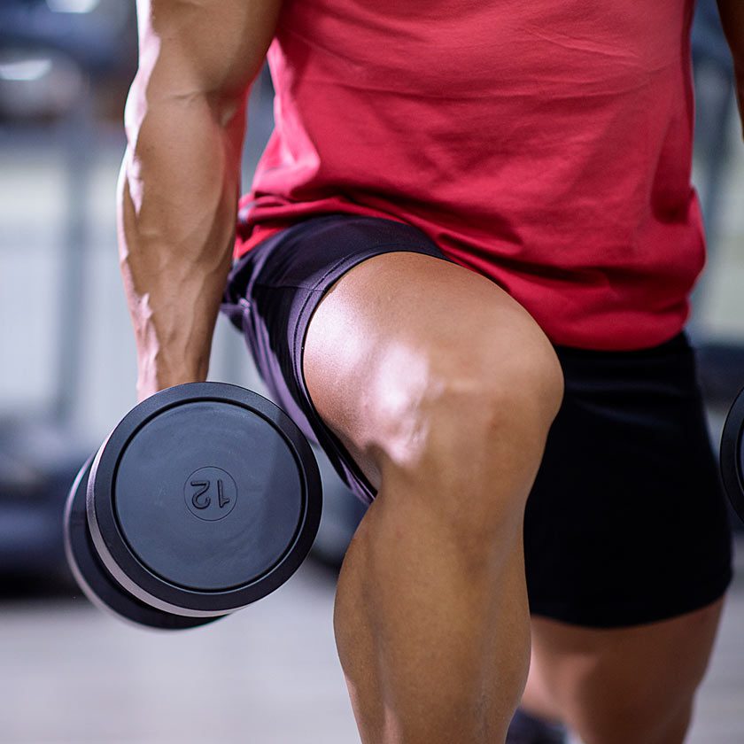 man working out with weights