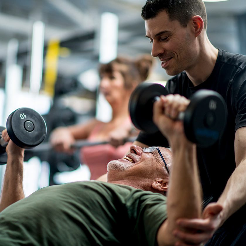 personal trainer and client working out