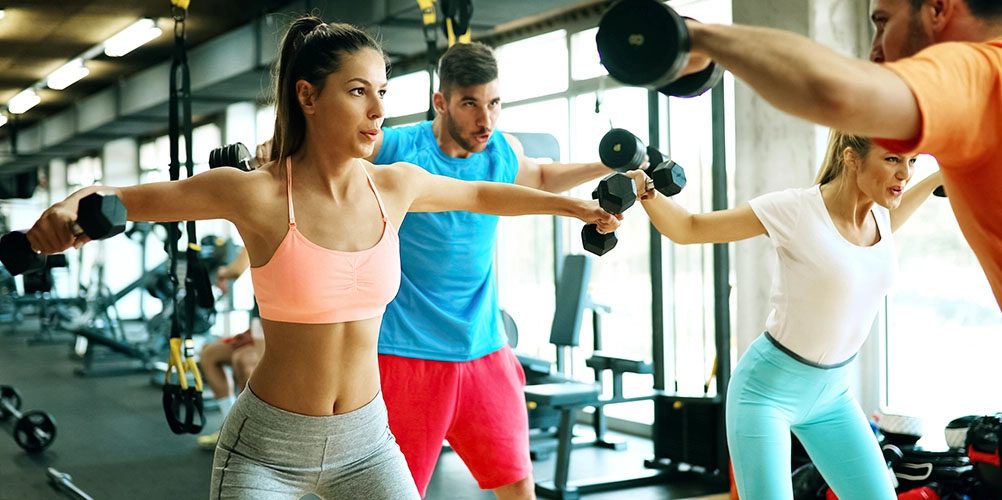 Group of people doing fly weights